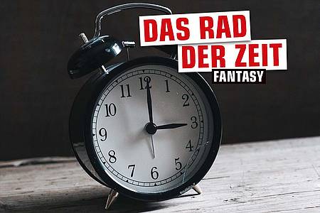 Wecker mit Aufschrift Das Rad der Zeit