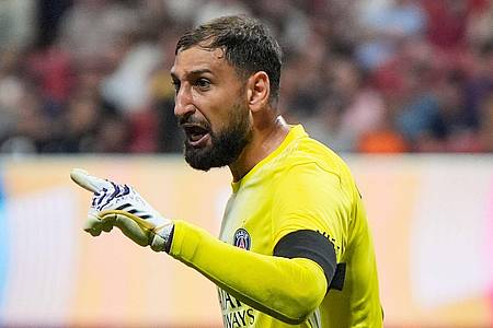 Mike Stewart/AP/dpa | PSG-Torwart Gianluigi Donnarumma rauschte in Jamal Musiala. War sein Einsatz zu riskant?
