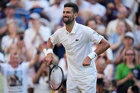 Kin Cheung/AP/dpa | «Pump it up»: Novak Djokovic mit seinem neuen Jubel.