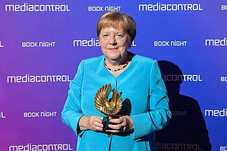 Uli Deck/dpa | Merkel mochte Blumendeko und Küche im Kanzleramt.